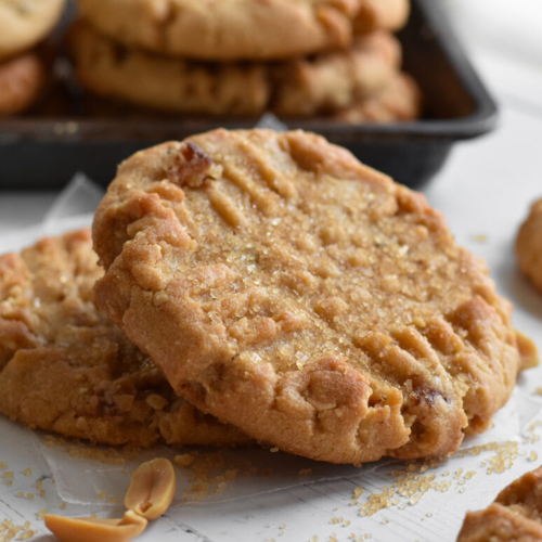 Bacon Peanut Butter Cookies with cookies in the background.