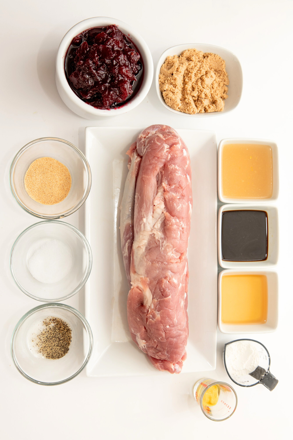 Vertical shot of cranberry pork tenderloin ingredients.