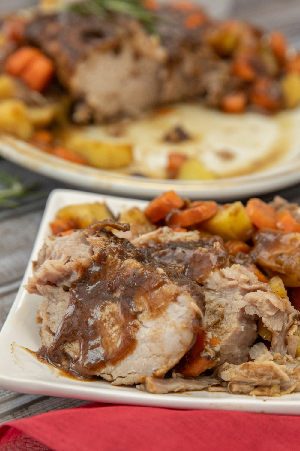 plated-pork-ribeye-roast-instant-pot A fresh serving of pork ribeye roast sliced on a plate.