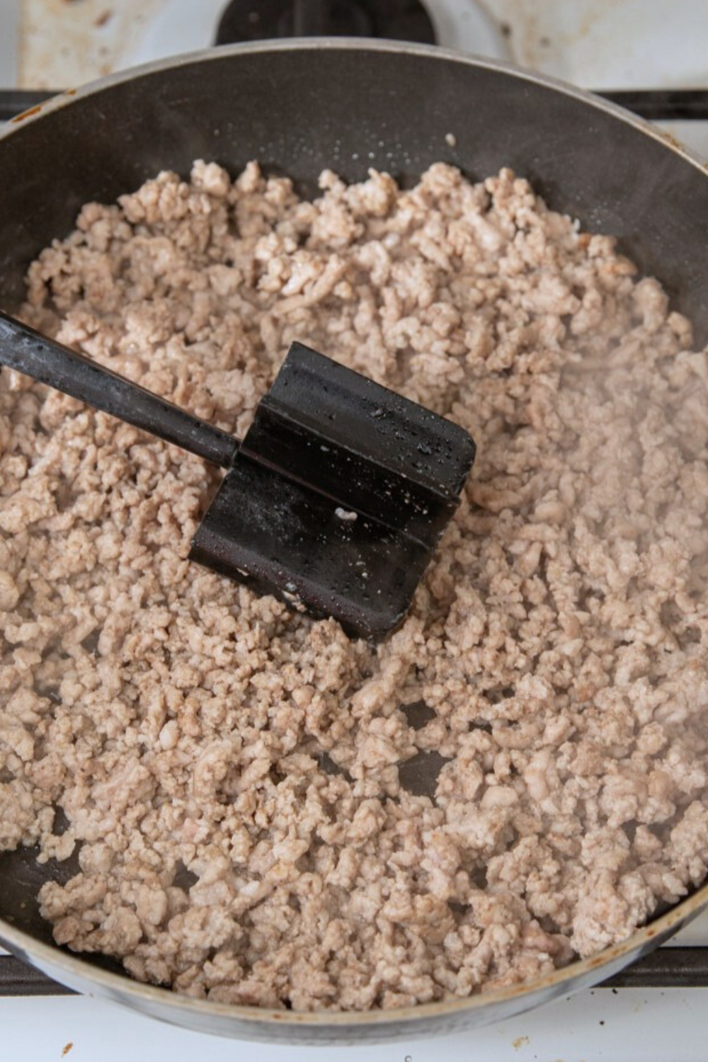 ground-pork-frying Ground pork browning in frying pan.