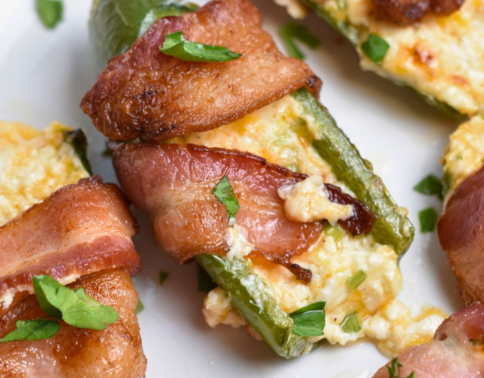 Jalapeno popper stuffed with cream cheese mixture and wrapped in crispy bacon.